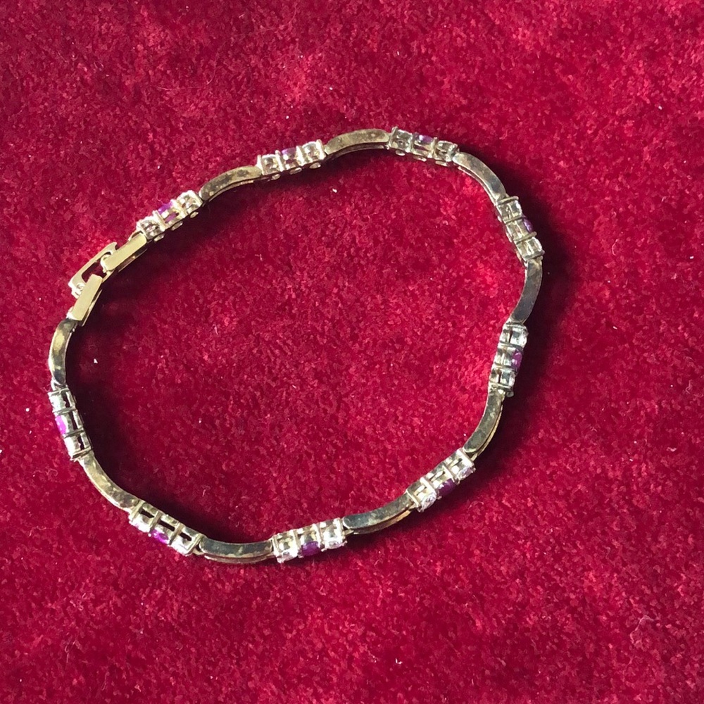 Gold bracelet ladies 7.5 with faux diamonds and rubies